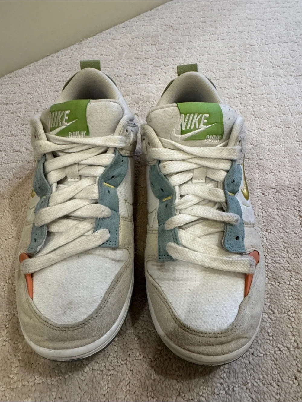 Nike Low-Top Sneakers in‎ White with Green, Blue, and Orange Accents